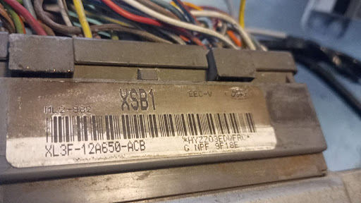 Reparación y programación de computadoras automotriz.